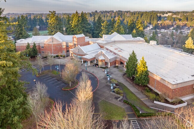 Discovery Middle School sits amongst towering fir trees in Lincoln, Vancouver, WA.