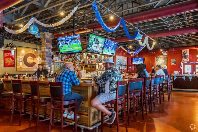 Catch a sports game at North Side Tavern near Harmony Park.
