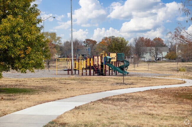 Kids can climb on the playground at Harrison Park.