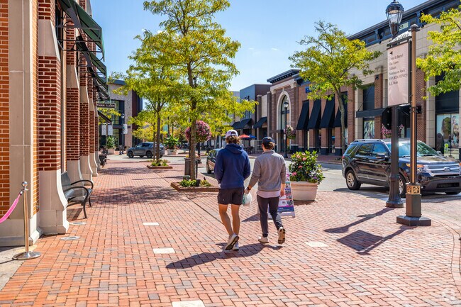 Explore the picturesque outdoor spaces and upscale retailers at Legacy Village.