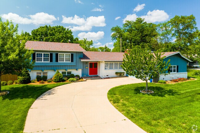 Two-story homes with large spacious driveways can be found in New Day.