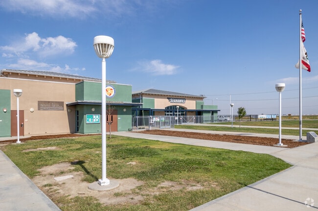Flags Fly High in the Morning at Megan Cope Elementary School in San Jacinto