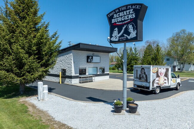 Grab a shake and a burger from Achatz Burgers to-go or drive-thru window in Pearl Beach.