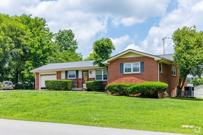 The red brick Ranch style home is older and represents most homes in Smyrna.