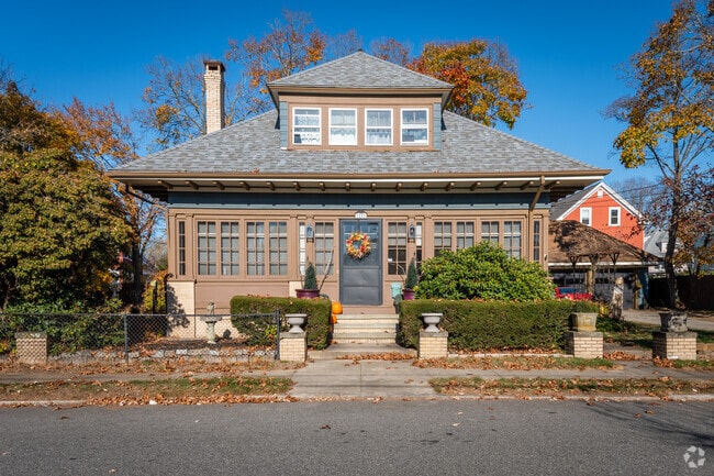 Find beautiful four square style homes like this one in the heart of Eden Park, RI.