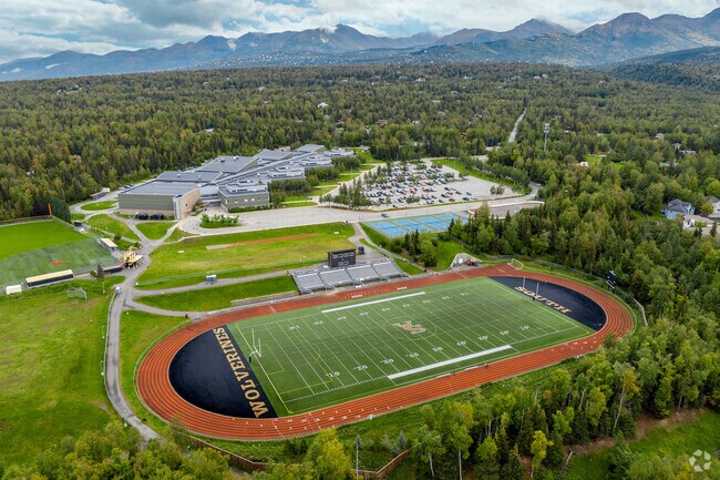 South Anchorage High School's massive campus is dramatically backdropped by mountains.