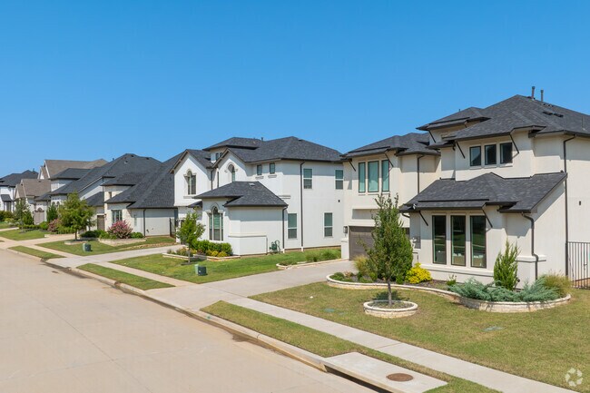 A row of New Traditional homes lines a quiet street in Vickery Park subdivision.