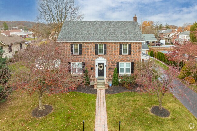 Brick Colonial Revivals are classy and desired in Longswamp neighborhoods like Topton.
