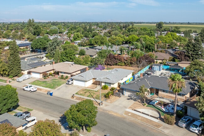 The Hoover area of Fresno is filled with walkable streets lined with mature shade trees.