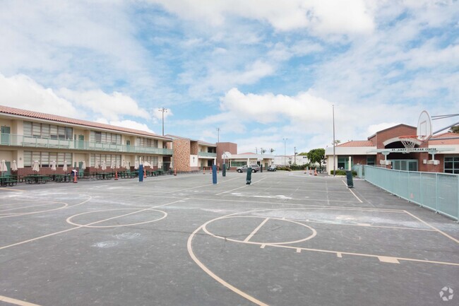 Play basketball at St. James Elementary School in West Torrance, CA.