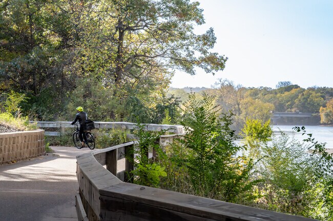 Bikers ride along the Chippewa River State Trail.