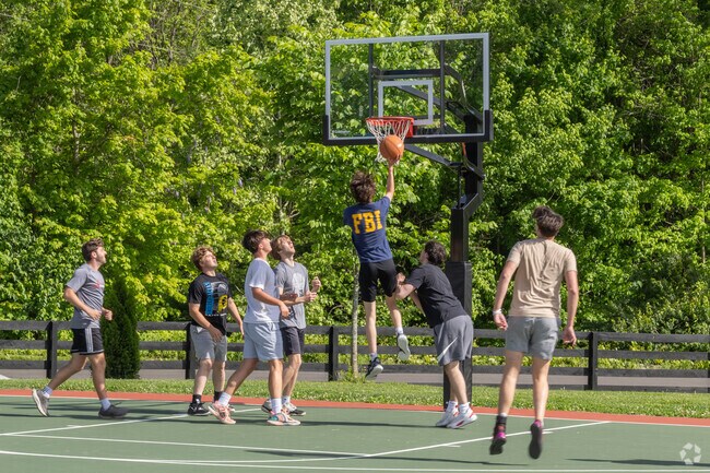 Local residents of Georgetown enjoy a game of basketball at Georgetown Park.