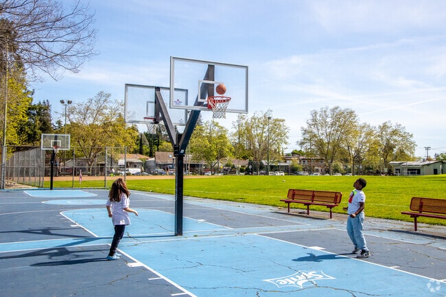 Kids love playing on the basketball field at Brookdale Park in Fremont.