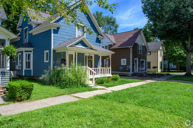 A row of Gablefront homes dominate a street in the Vine neighborhood.