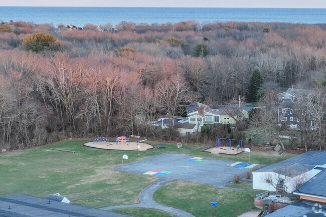 Students burn off some energy on the playground at Hatherly Elementary School in Scituate.