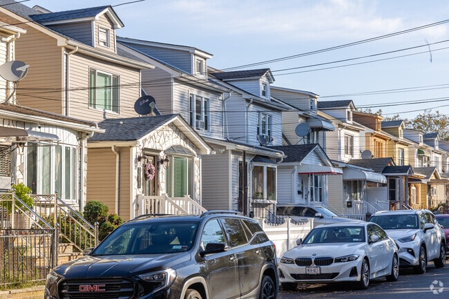 A row of a variety of house style in Kew Gardens Hills.