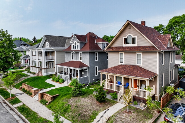 Homes with inviting porches line the quiet streets of Lowry Hill East.
