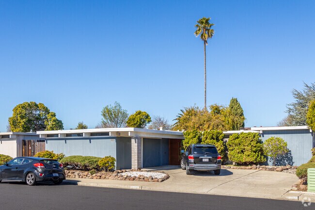 Low mid-century modern homes cluster in central Treasure Isle.
