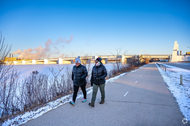 Enjoy a walk on the Fox River Trail that runs though De Pere.