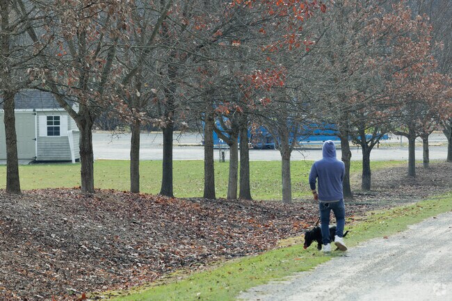 Taking a moment to walk the dog in Creekside Park in Factoryville, PA.