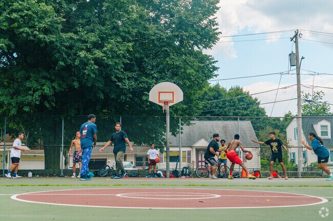 Locals of Centralville enjoy getting together at McPherson Park to play basketball.