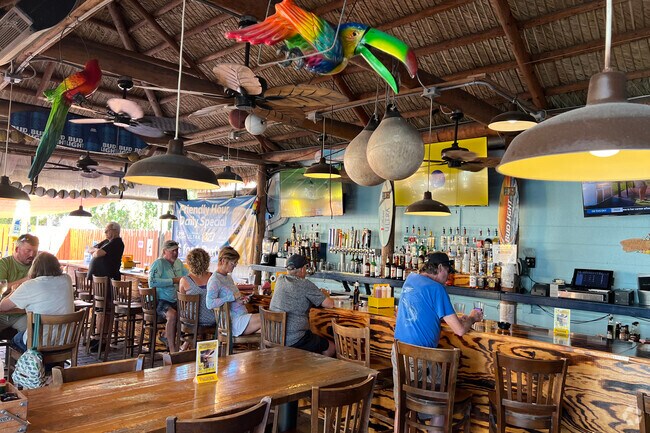 Captain Eddies Bar offers a tropical themed atmosphere and great casual dining and drinks.