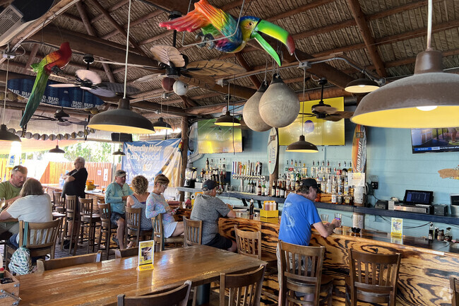 Captain Eddies Bar offers a tropical themed atmosphere and great casual dining and drinks.