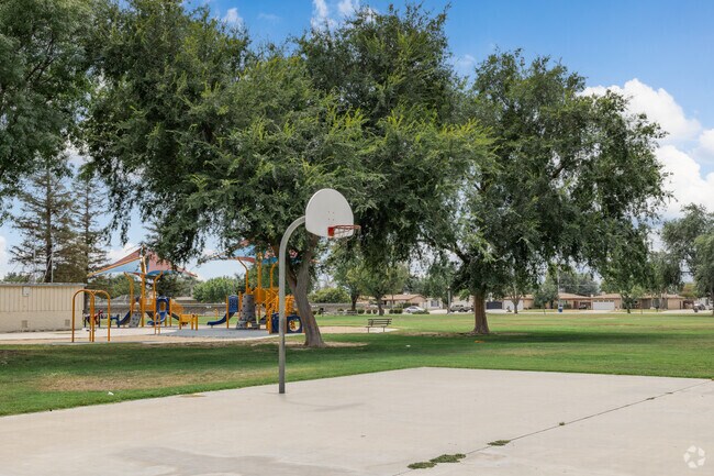 Play a pick-up game of basketball at Challenger Park in Bakersfield.