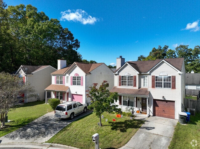 A row of colorful homes line a street in McIntosh.