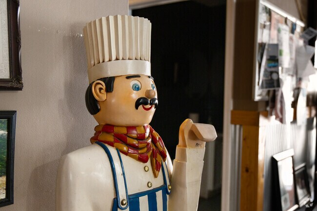 This friendly chef spends his days welcoming the many regulars of Tyler's Pizza.