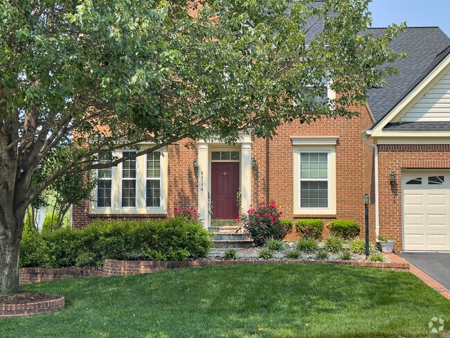 Brick Colonial single family homes are common in Countryside.