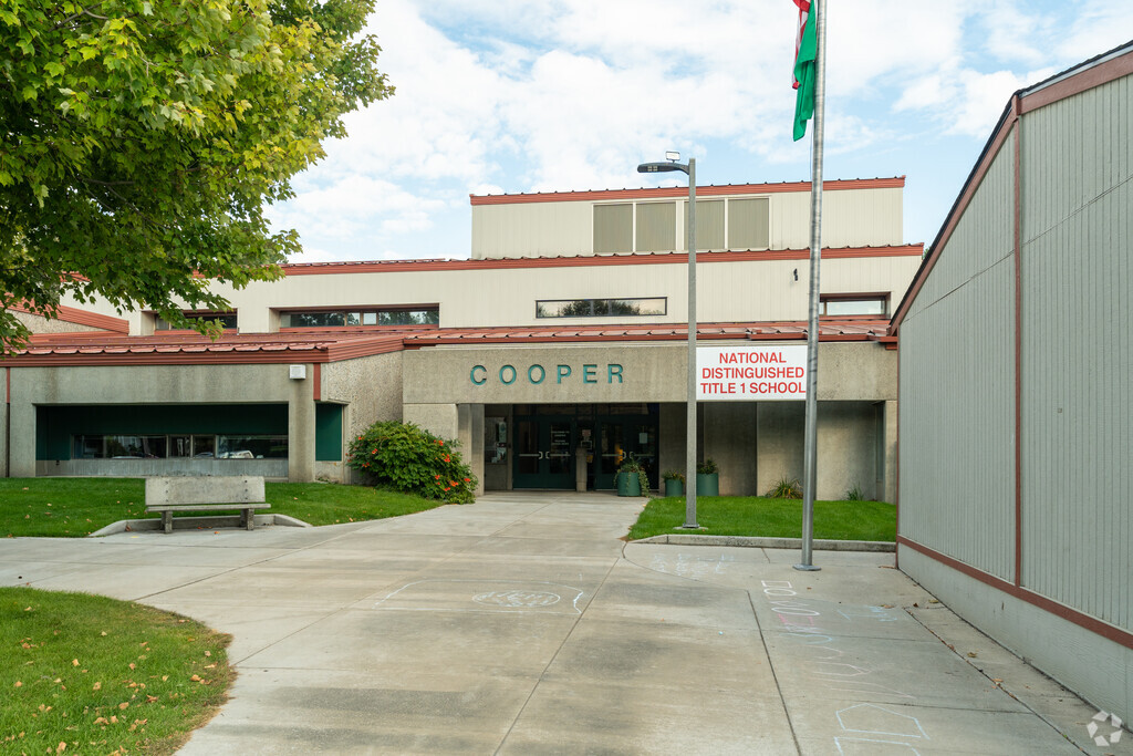 Cooper Elementary is covered with a lush tree canopy.