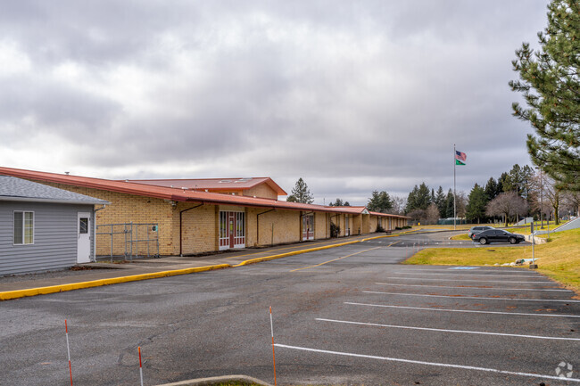 The Continuous Curriculum school is located in a rural neighborhood.
