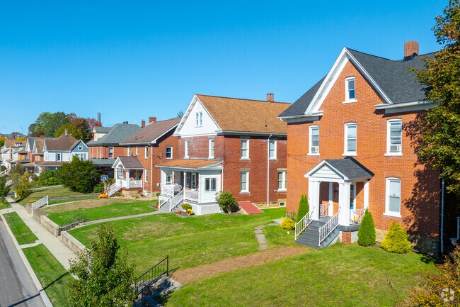 A row of houses sits quaintly behind sidewalks in Ebensburg.