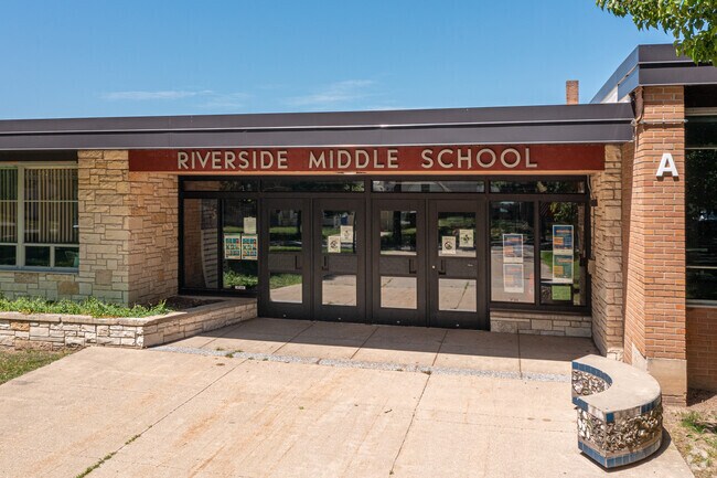 The Riverside Middle School name rests on the main entrance of the school near North East Citizens Action neighborhood.