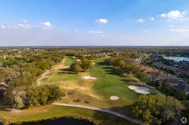 Sand pits and lakes are found on the harder golf courses within Solivita's Cypress golf course.