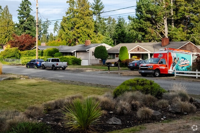 Many homes in Sherwood Forest feature well-maintained lawns and landscaping with curb appeal.