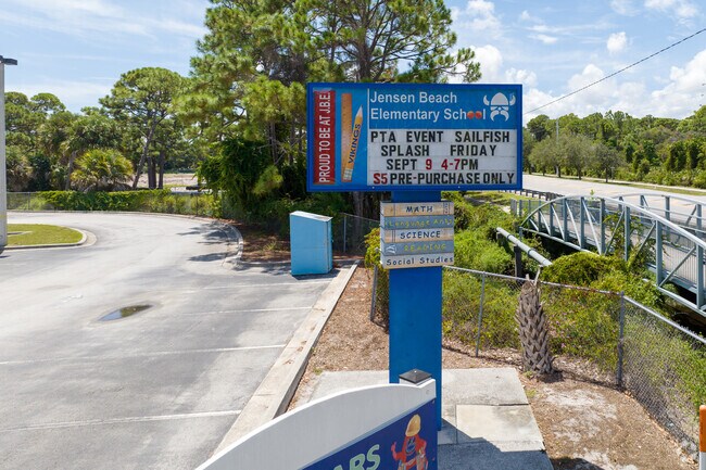 Welcome to Jensen Beach Elementary signage and parking lot.