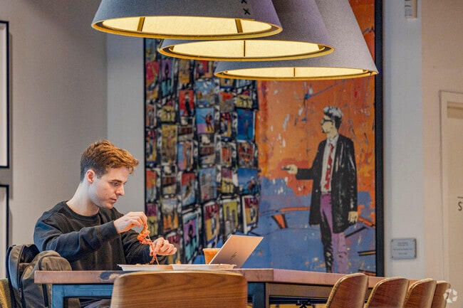 Local Queen Bee patron enjoying lunch while getting some work done in Yarrow Point.