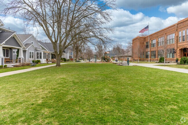 The Washington School Green with condos and new houses on either side, in the Historic District.