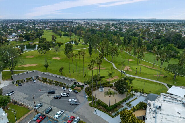 Candlewood Country Club pairs golf with a fitness center and terrace dining.