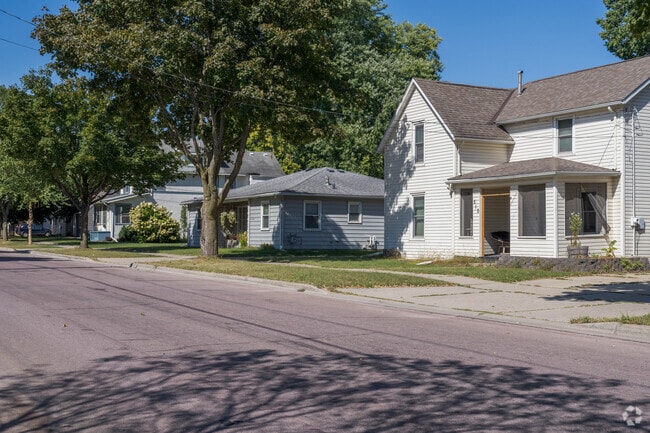 Rows of various home sit on tree-lined streets in the Sibley Park neighborhood.