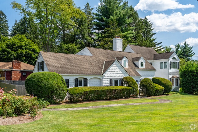 Many homes in Purchase sit on large, well-maintained lots with open green space.