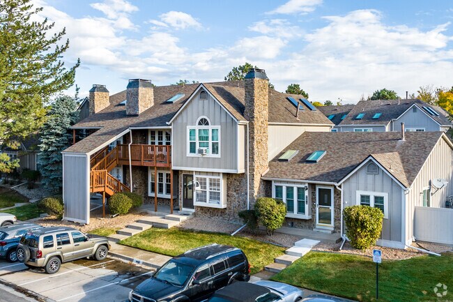 Some townhouse condos in Charter are lined with stone accents.