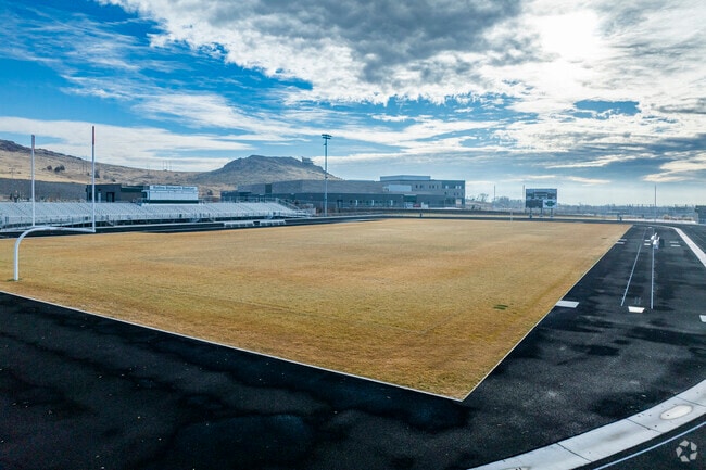 The football field at Procter R Hug High School.