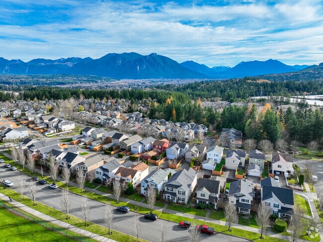The Snoqualmie neighborhood is surrounded by beautiful mountains and hills.