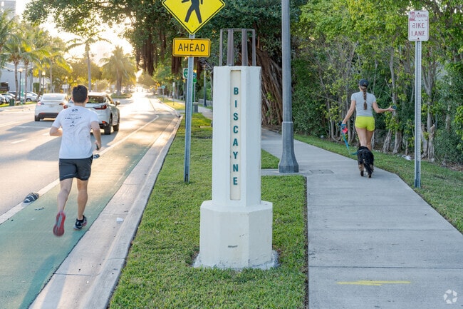 Residents of Venetian Islands enjoy walking and running by the sign for Biscayne Island.