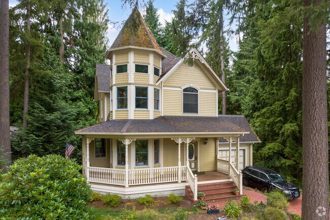 Neighborhood character shines through this wooded South Forest Park property.