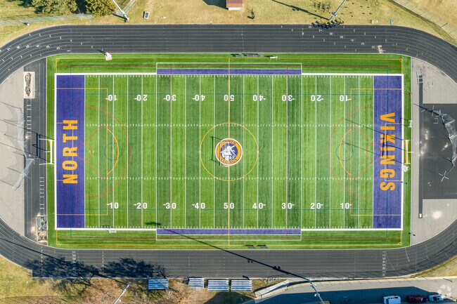 North High School near Regis offers dual enrollment and strong academic programs.