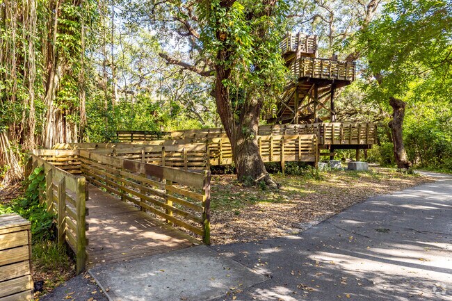 Tree Tops Park near Fern Crest Village features scenic walking trails and observation towers.